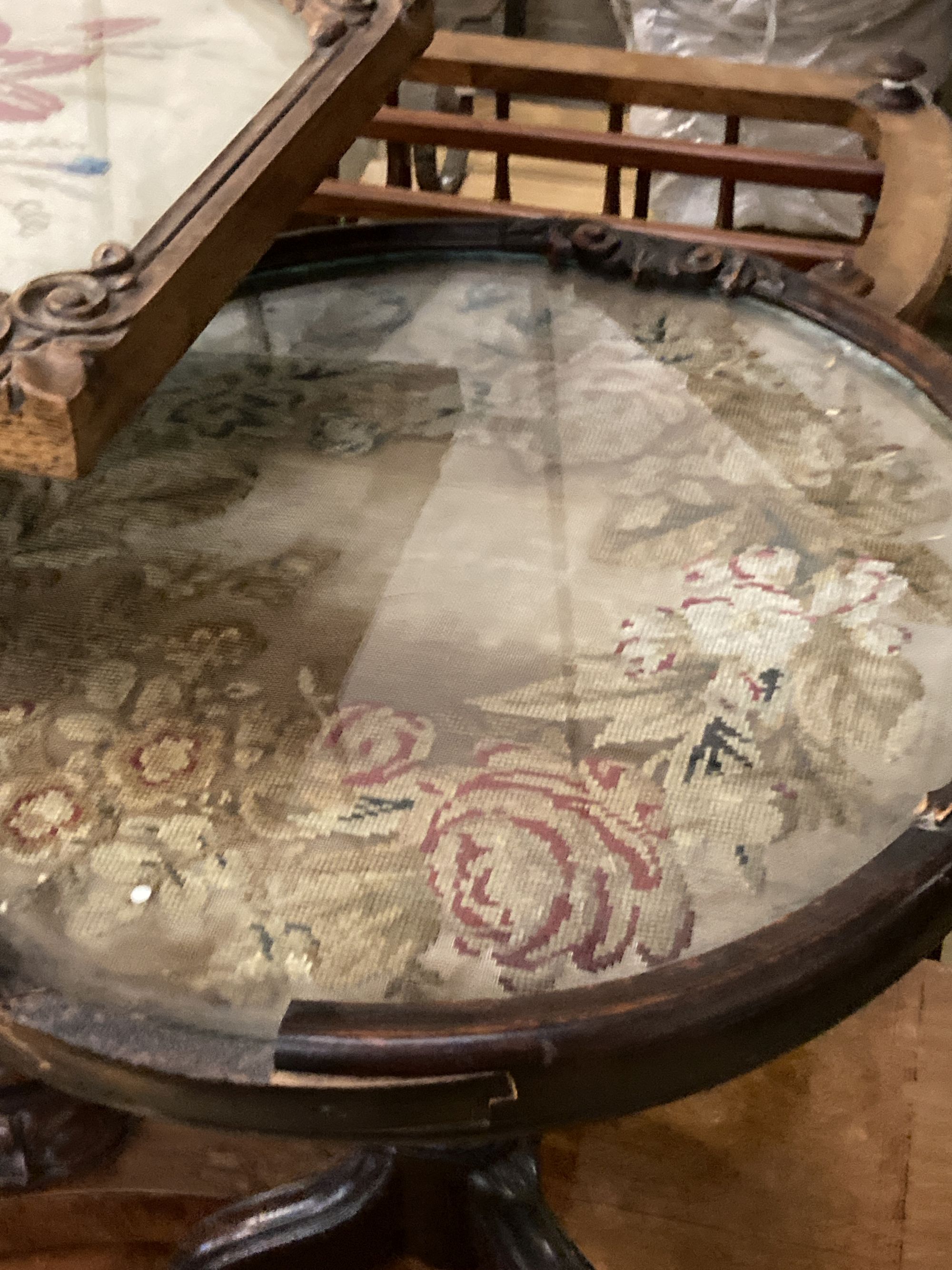 A Victorian rosewood table, with square floral tapestry inset top, over fluted bulbous pillar and triform platform base, height 63cm to